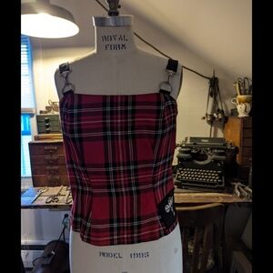 Vintage '90s red and black plaid top with buckles. Size large.